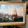 A classic antique gold frame and linen liner gloriously complement this meticulous and skillful copy of The Redoutable at Trafalgar, originally painted in 1836 by Auguste Etienne Francois Mayer. In one of many portrayals of the famous naval battle of 1805, the Redoutable, with all three masts gone, is being fired on by the Temeraire on the right, the same ship painted by Turner in 1824 as it was being towed back up the Thames for demolition in 1824.