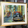 How about this bright and jazzy painting from Cuba? Its liquid light is contained by a standard white linen liner and a gold frame that has been hand-rubbed to let the red bole show through from beneath.